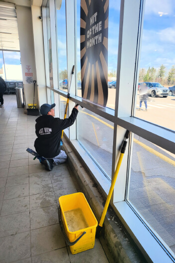 Interior commercial window cleaning at a large supermarket location in Stratford.